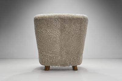 Scandinavian Easy Chairs in Sheepskin with Ottomans Scandinavia ca 1950s
