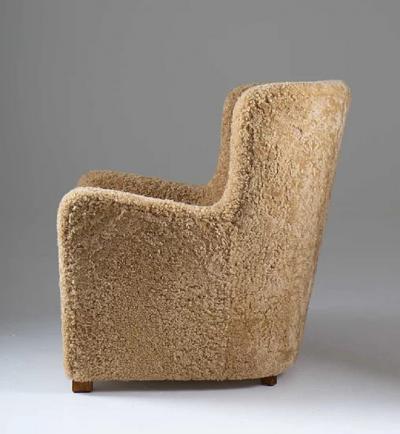 Scandinavian Mid Century Lounge Chair in Sheepskin