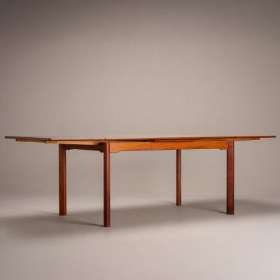 Scandinavian Modern Danish Teak Extendable Dining Table