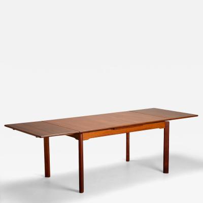 Scandinavian Modern Danish Teak Extendable Dining Table