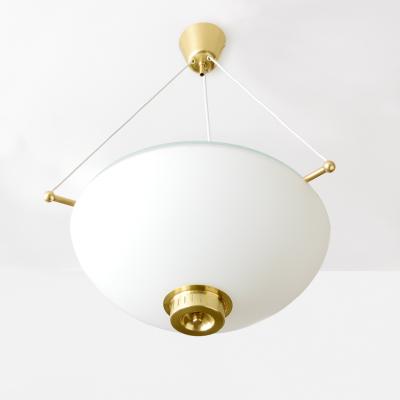 Scandinavian modern opaline glass half globe pendant with brass elements 1950