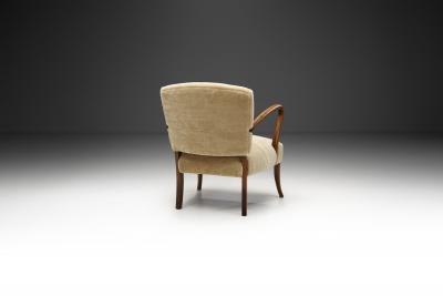 Sculptural Armchair with Curved Arms Europe ca 1950s