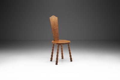 Sculptural Patinated Oak Spinning Chair Europe ca early 20th century