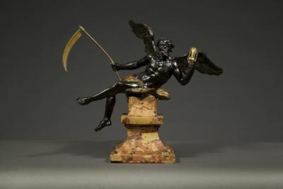 Sculpture of Cronus resting on a breccia marble pedestal