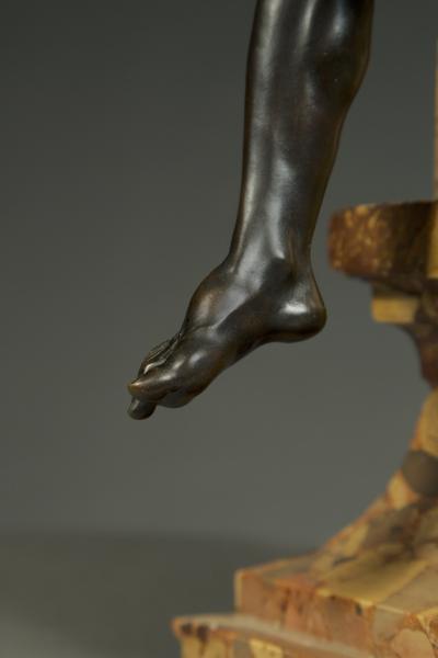Sculpture of Cronus resting on a breccia marble pedestal