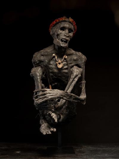 Sculptured model of a smoked Papua Mummie papier m ch 20th C