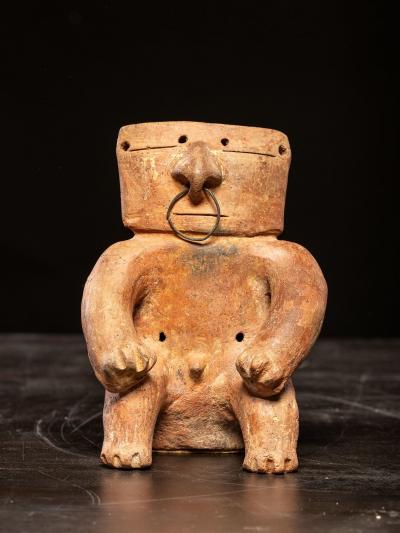 Seated terracotta Figure with nose ring Quimbaya culture ca 100 AD