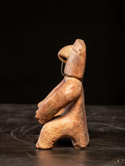 Seated terracotta Figure with nose ring Quimbaya culture ca 100 AD
