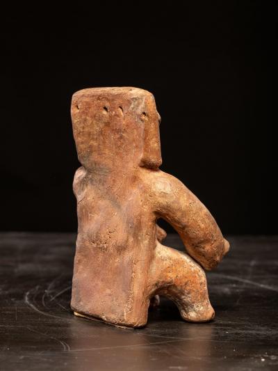 Seated terracotta Figure with nose ring Quimbaya culture ca 100 AD