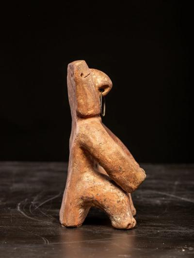 Seated terracotta Figure with nose ring Quimbaya culture ca 100 AD