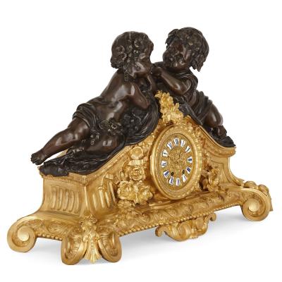Second Empire period patinated and gilt bronze three piece clock set
