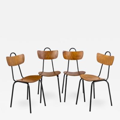 Series of four chairs in wood and metal 1950s