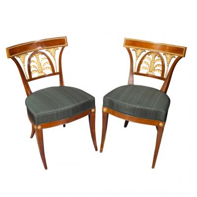 Set Of Ten Baltic Neoclassical Mahogany And Giltwood Dining Chairs