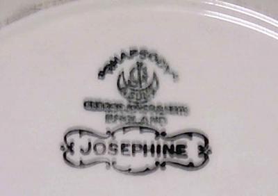 Set of 12 English Victorian cream colored porcelain plates