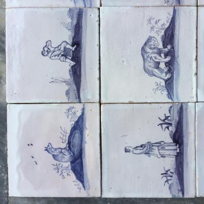 Set of 16 Blue and White Delft Tiles with Animals and Figures 18th Century