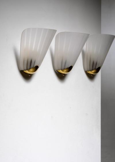 Set of 3 brass and glass wall lamps