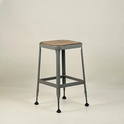Set of 4 Adjustable Patinated Steel Counter Stools by Lyon Manufacturing
