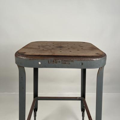 Set of 4 Adjustable Patinated Steel Counter Stools by Lyon Manufacturing