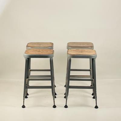 Set of 4 Adjustable Patinated Steel Counter Stools by Lyon Manufacturing