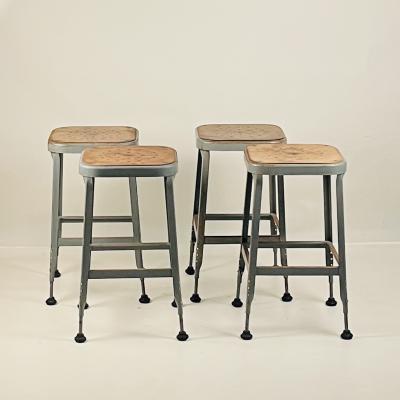 Set of 4 Adjustable Patinated Steel Counter Stools by Lyon Manufacturing