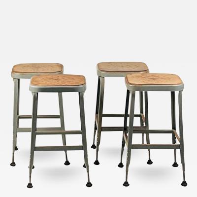 Set of 4 Adjustable Patinated Steel Counter Stools by Lyon Manufacturing