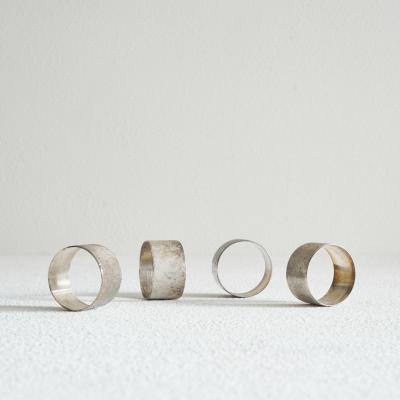 Set of 4 Midcentury Napkin Rings in Patinated Silver