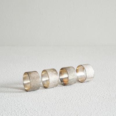 Set of 4 Midcentury Napkin Rings in Patinated Silver