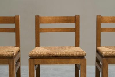 Set of 4 Modernist Chairs in Solid Oak and Straw Belgium 1960s
