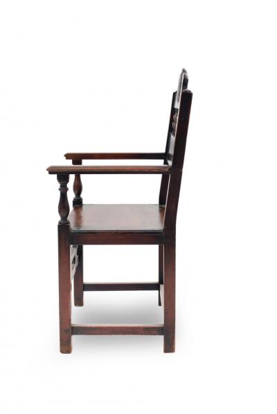 Set of 7 English Renaissance Spindle and Crest Walnut Armchairs