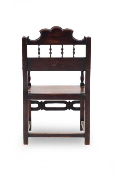 Set of 7 English Renaissance Spindle and Crest Walnut Armchairs