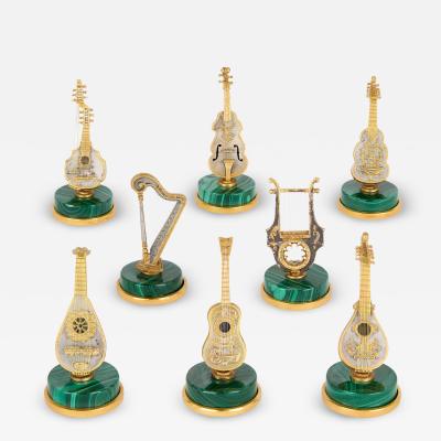 Set of 8 Italian silver silver gilt and malachite musical instrument models
