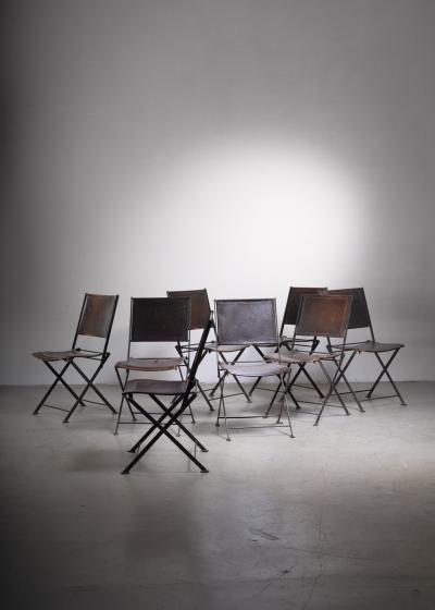 Set of 8 industrial French metal and leather folding chairs