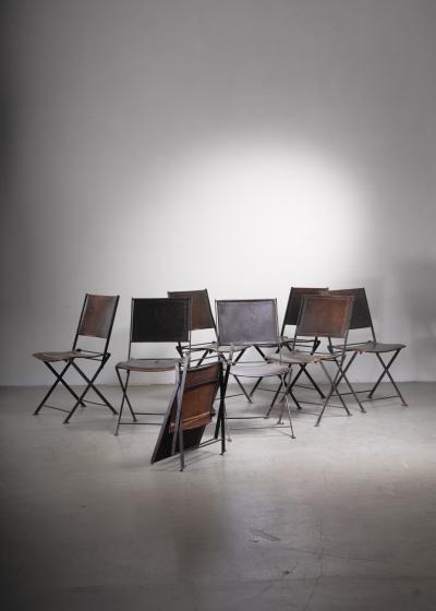 Set of 8 industrial French metal and leather folding chairs