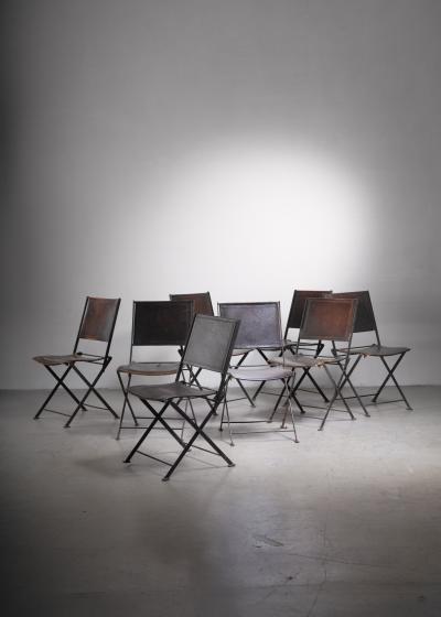 Set of 8 industrial French metal and leather folding chairs
