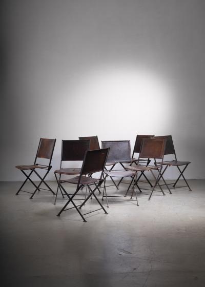 Set of 8 industrial French metal and leather folding chairs