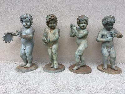 Set of Four Bronze Classical Style Musical Putti or Cherub Garden Statuary