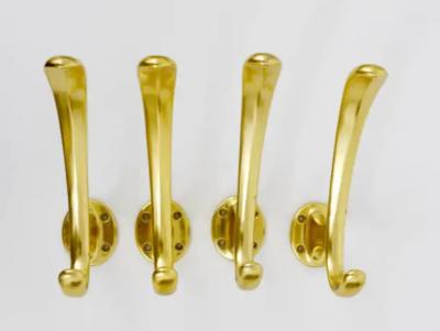 Set of Four Golden Midcentury Wall Hooks Austria Vienna 1950s