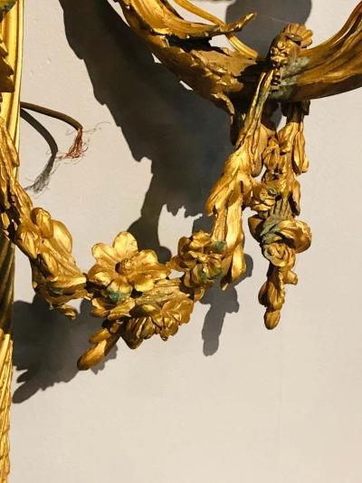 Set of Four Large Ornate Three Light Torch and Ribbon Form Wall Sconces