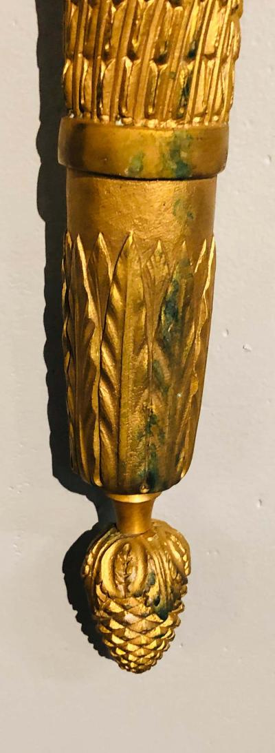 Set of Four Large Ornate Three Light Torch and Ribbon Form Wall Sconces