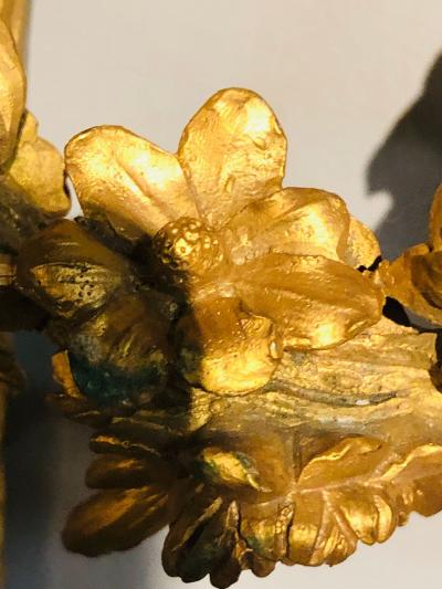 Set of Four Large Ornate Three Light Torch and Ribbon Form Wall Sconces