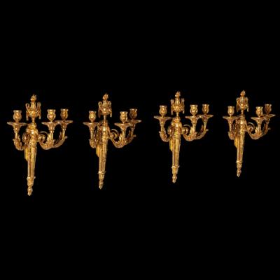 Set of Four Louis XV Ormolu Three Branch Wall Lights Circa 1770