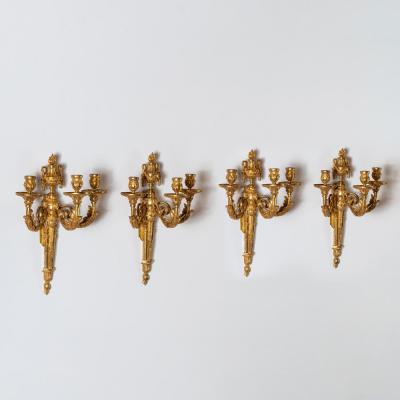 Set of Four Louis XV Ormolu Three Branch Wall Lights Circa 1770