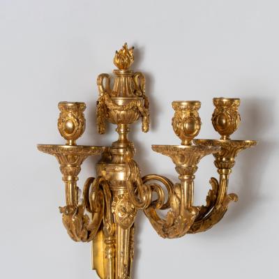 Set of Four Louis XV Ormolu Three Branch Wall Lights Circa 1770