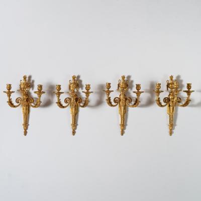 Set of Four Louis XV Ormolu Three Branch Wall Lights Circa 1770