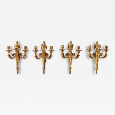 Set of Four Louis XV Ormolu Three Branch Wall Lights Circa 1770