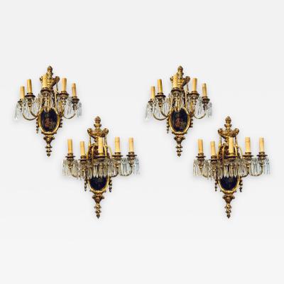 Set of Four Louis XVI Style Bronze and Crystal Rams Head Five Light Sconces