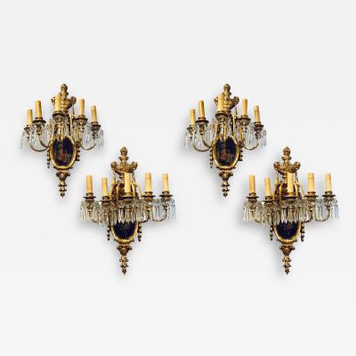Set of Four Louis XVI Style Bronze and Crystal Rams Head Five Light Sconces