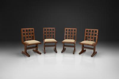 Set of Four Oak Dining Chairs with Geometric Backs Europe Mid 20th Century