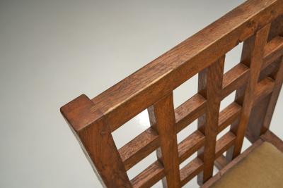 Set of Four Oak Dining Chairs with Geometric Backs Europe Mid 20th Century