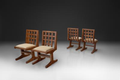 Set of Four Oak Dining Chairs with Geometric Backs Europe Mid 20th Century